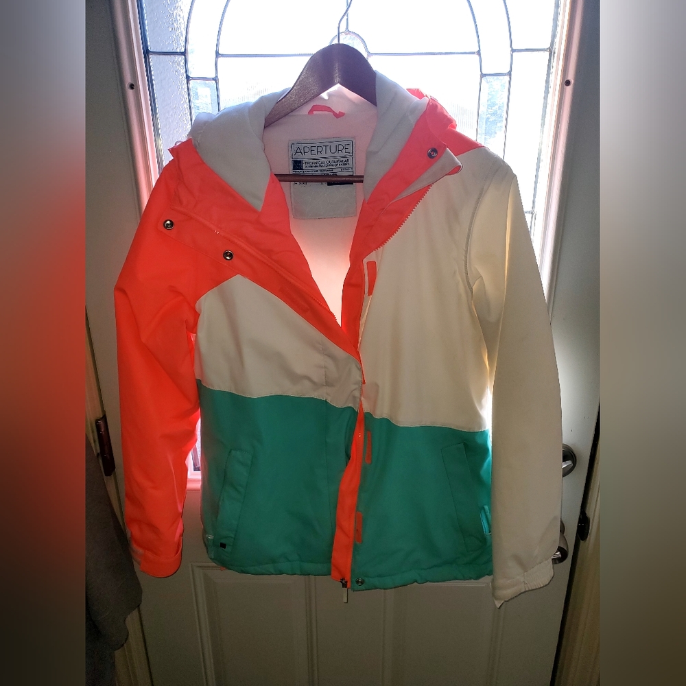 Aperture ski jacket women's medium. White, orange and green.